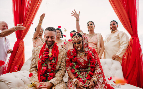 ndian wedding catering setup with curries, naan, and desserts in Jamaica