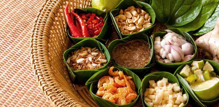 Thai chilies balanced with lime and herbs in a dish