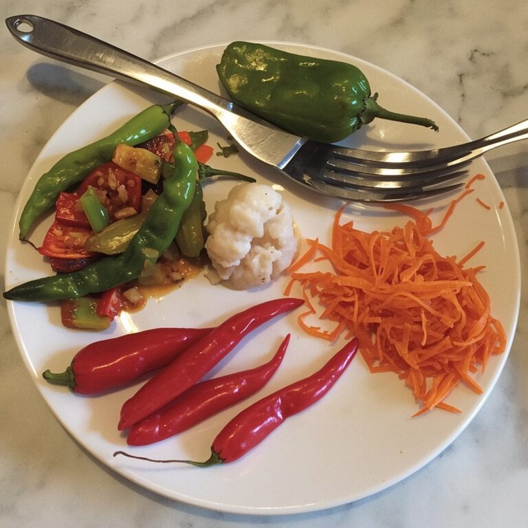 Thai chilies and Scotch bonnet used thoughtfully in a dish