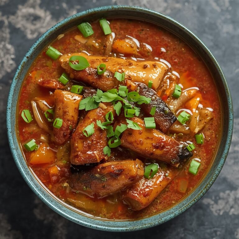 Thai dish finished with fresh herbs and balanced presentation